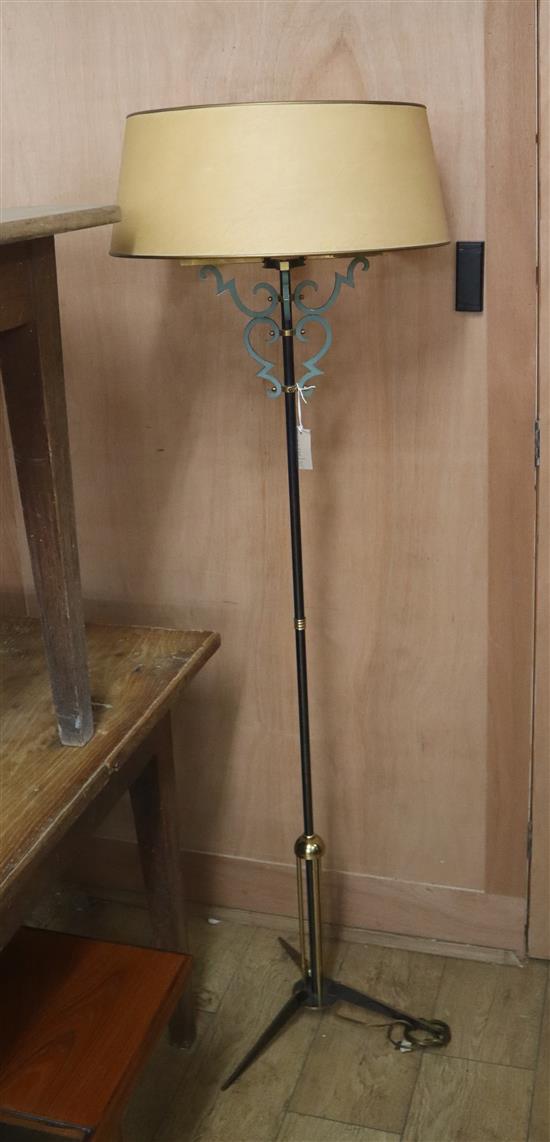 A mid-century French brass and metal standard lamp